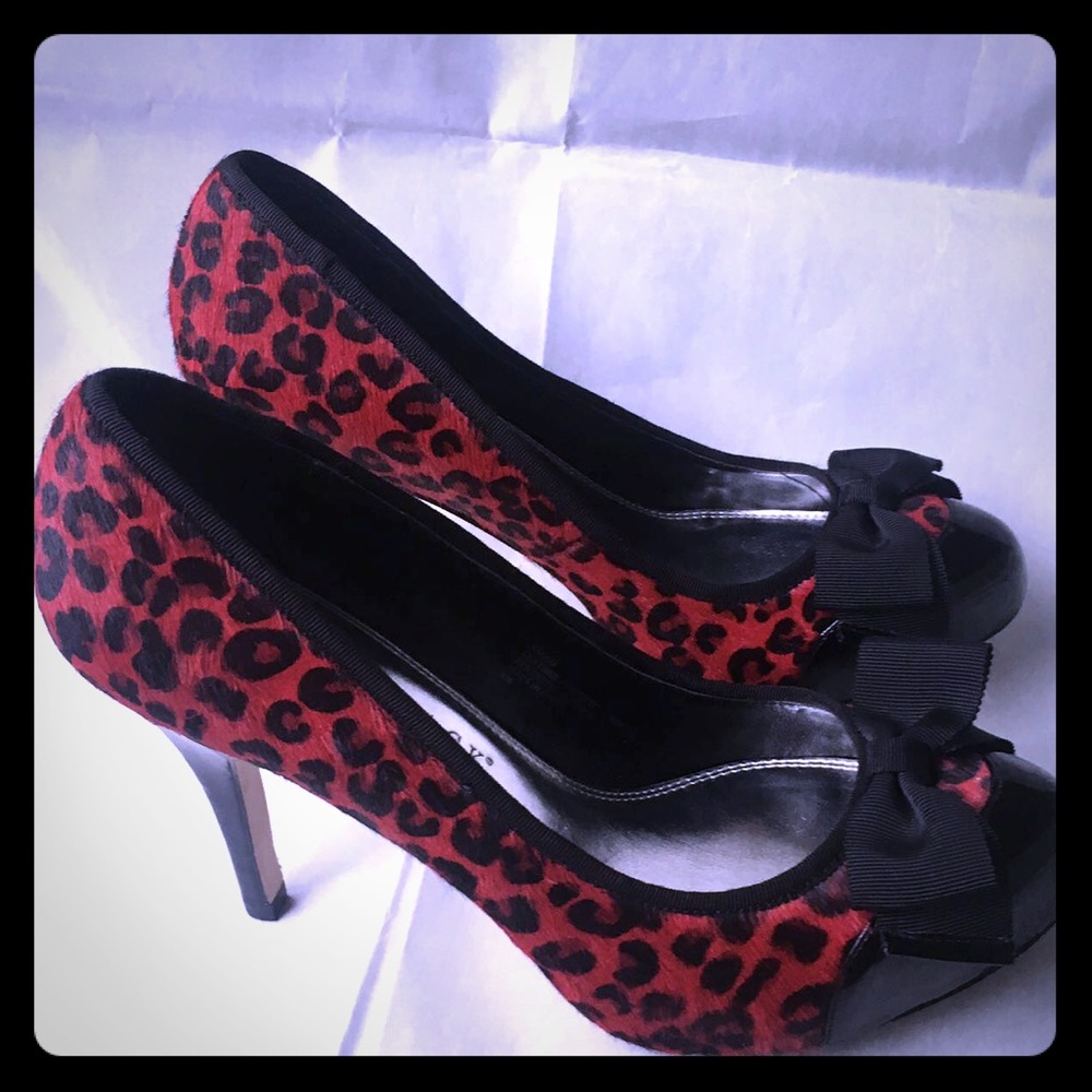 Classic Black and red heels with a bow